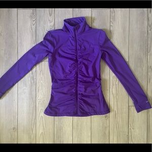 Small workout jacket fitted at the waist